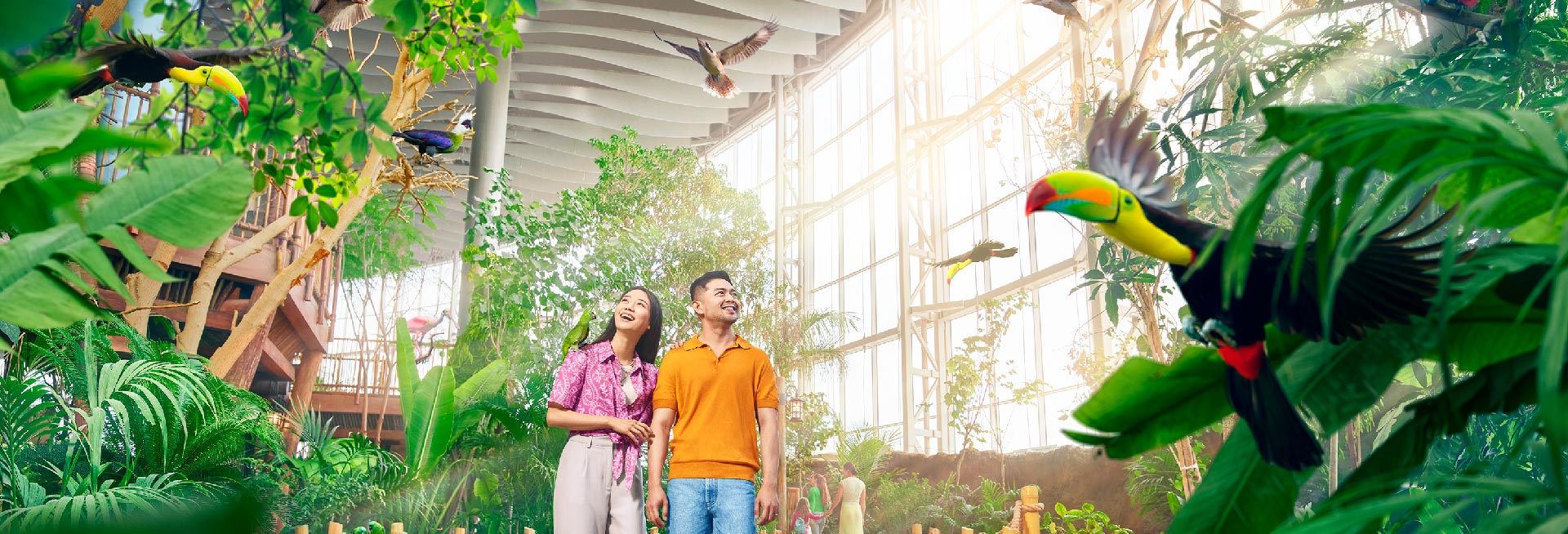 Couple walking at the aviary in Tropical Ocean