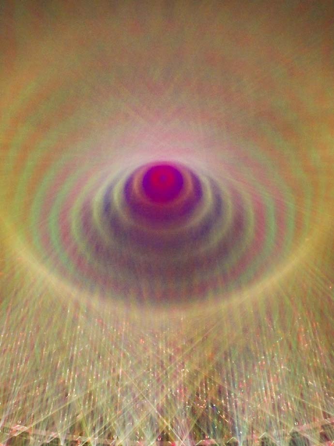 Yellowish ray of laser light from Light Sculpture Flow artwork